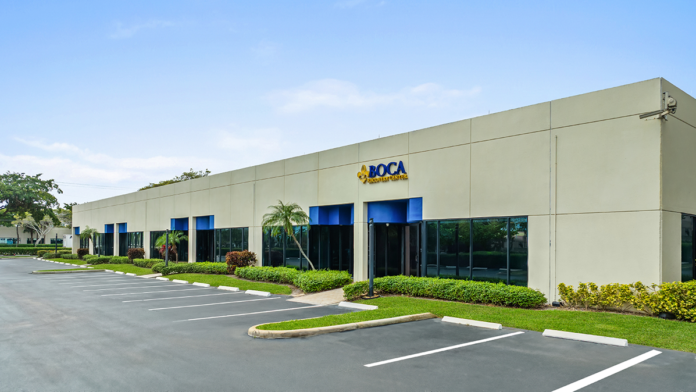 Exterior side view of the Boca Recovery Center facility and front windows.