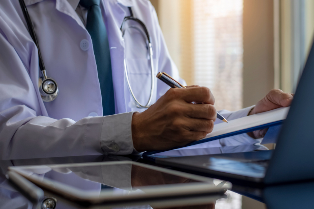 doctor writing suboxone script