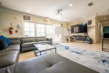 Relaxing luxurious living room space at Reign Residential Treatment Center in Southwest Ranches, FL
