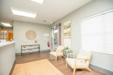 Interior front entrance area with reception desk at Sanctuary Mental Health & Wellness in Seymour, TN