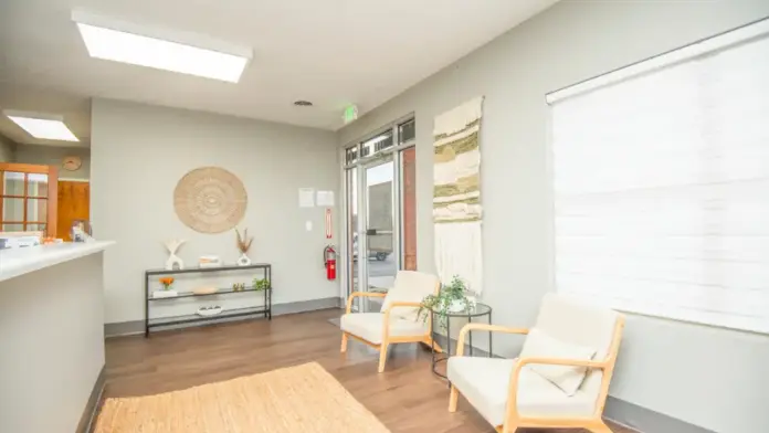 Interior front entrance area with reception desk at Sanctuary Mental Health & Wellness in Seymour, TN