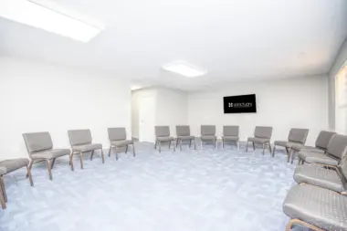 A large group counseling room at Sanctuary Mental Health & Wellness in Seymour, TN, with a circle of chairs for therapy