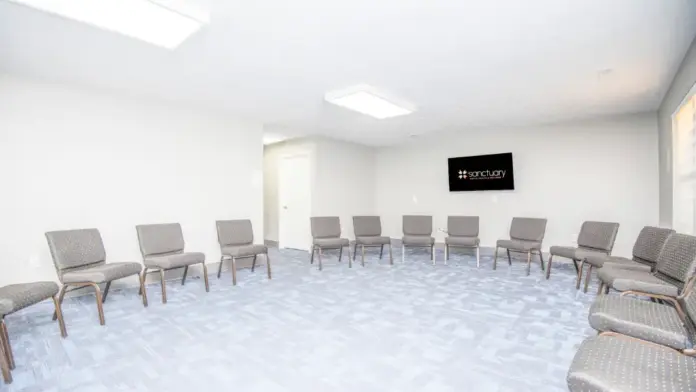 A large group counseling room at Sanctuary Mental Health & Wellness in Seymour, TN, with a circle of chairs for therapy