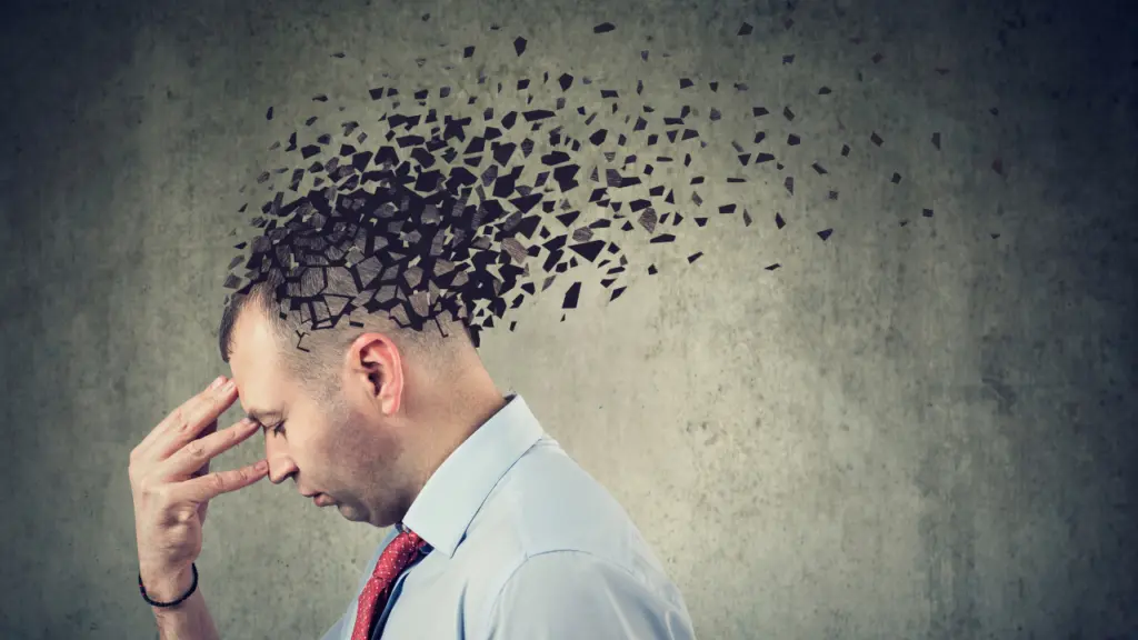 Depiction of a man's head falling to pieces, symbolizing a loss of brain function
