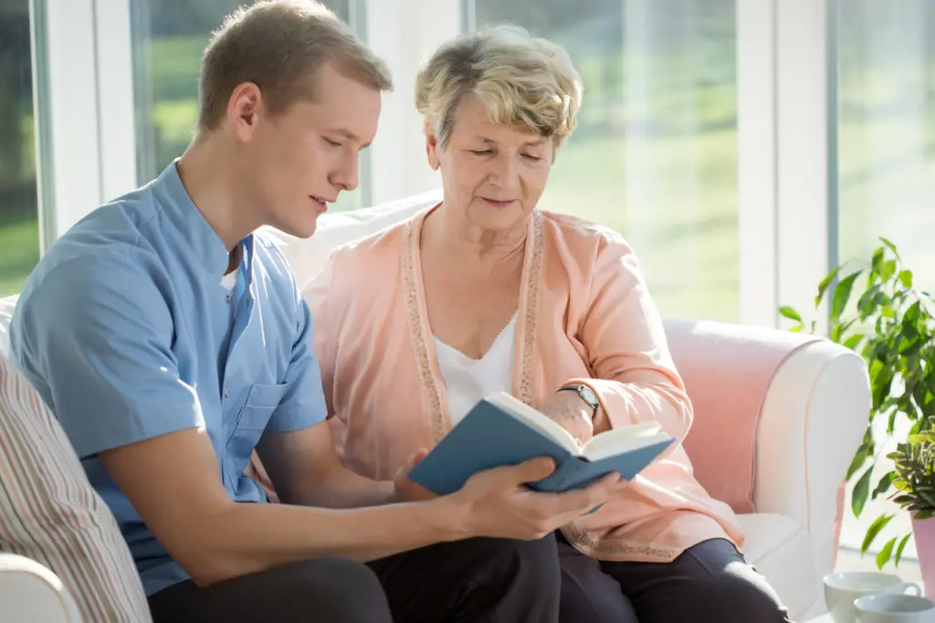 A doctor speaks with a patient at an inpatient care center