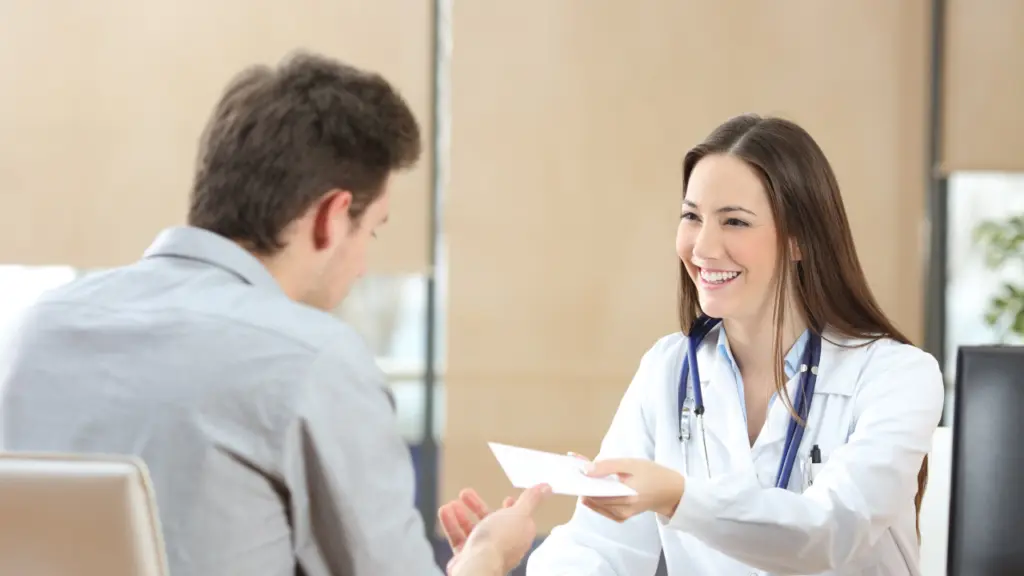 A doctor speaks with a patient at a dual diagnosis appointment