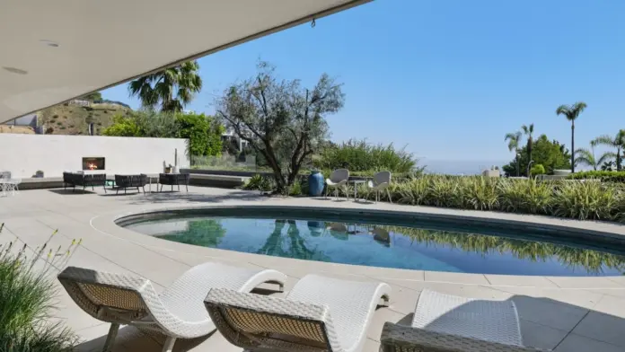 Carrara Treatment back yard patio and pool luxury design