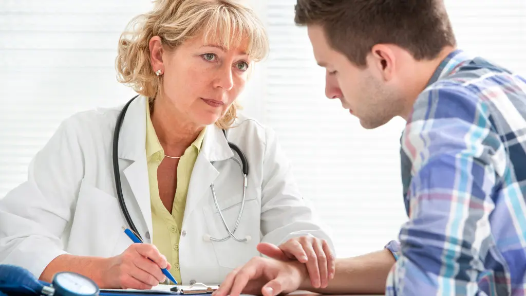 A doctor speaks with a patient during an alcohol withdrawal assessment