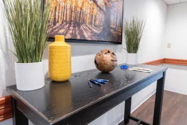 Arista Recovery Ohio interior welcome table with decor and framed artwork