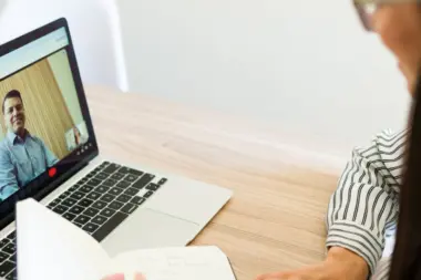 A patient speaking with a doctor through a telehealth call