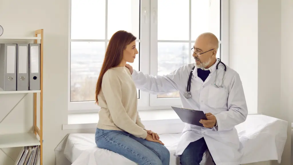 A doctor comforts a patient. Learn more about Ativan addiction here.