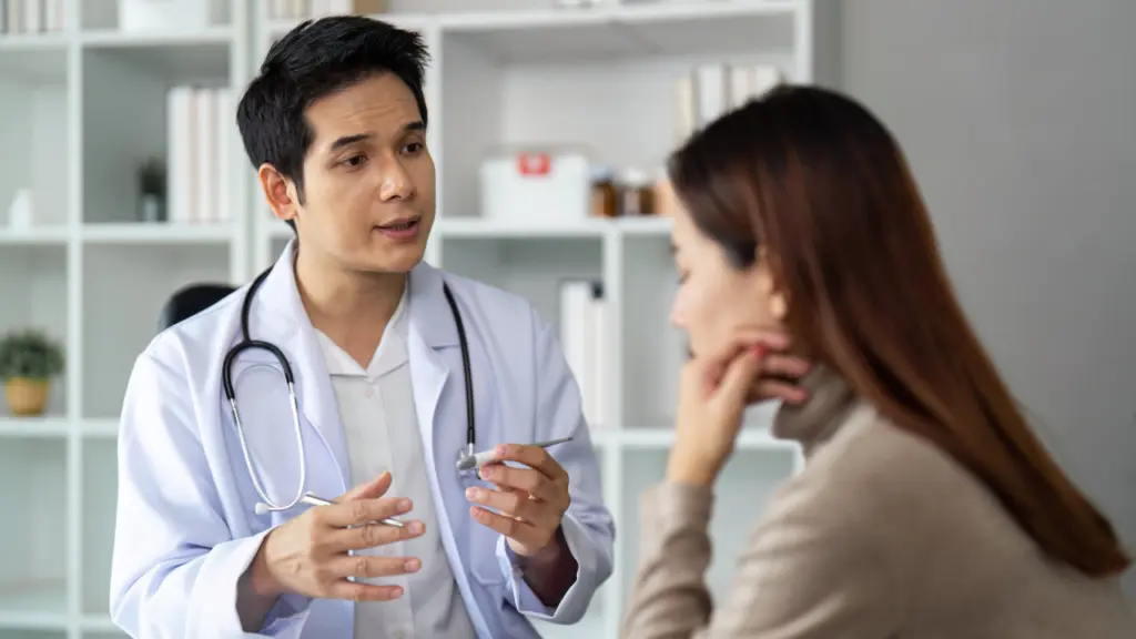 A doctor discusses treatment options with a patient